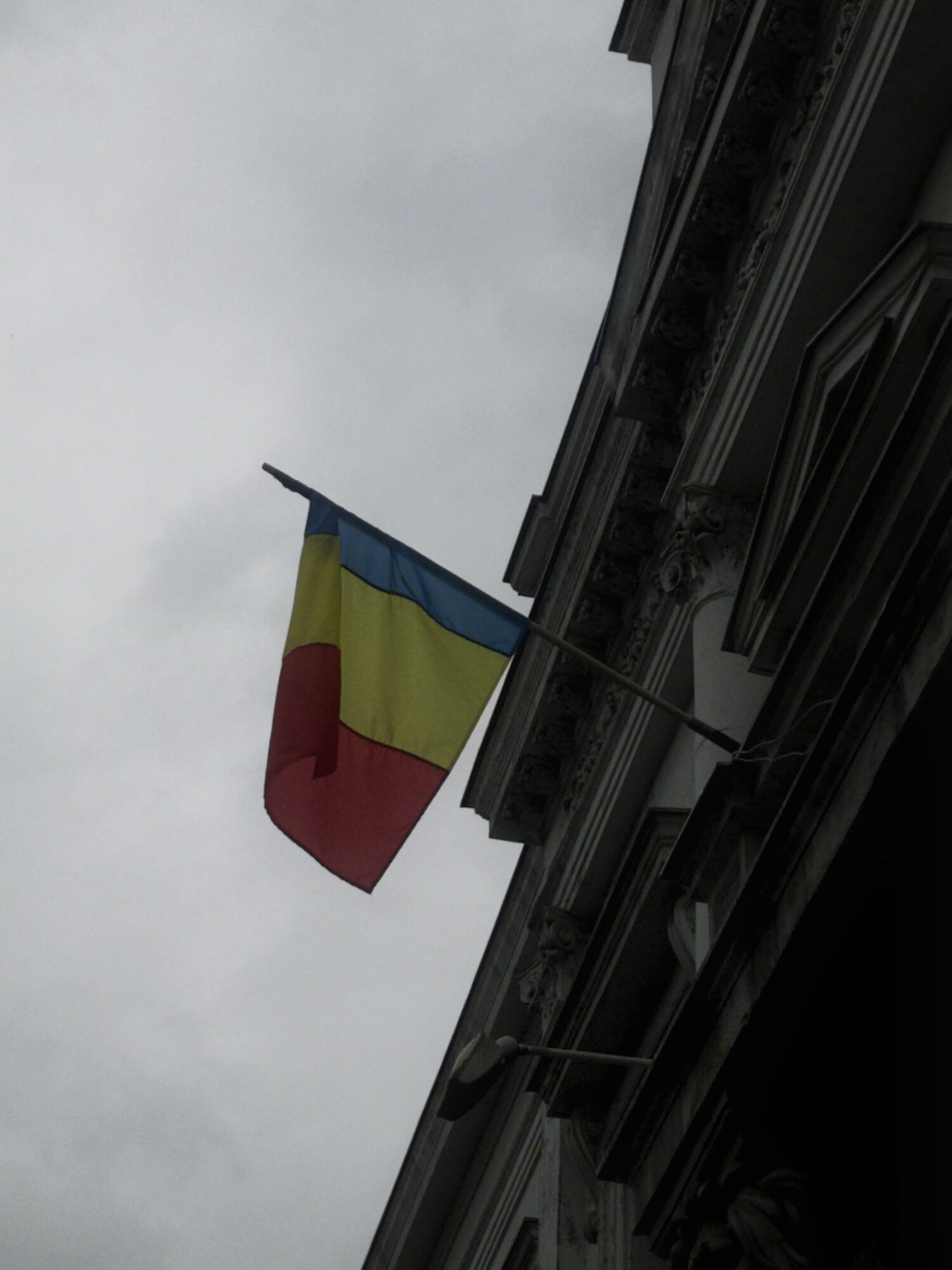 Flag on an old facade