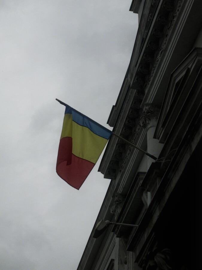 Flag on an old facade